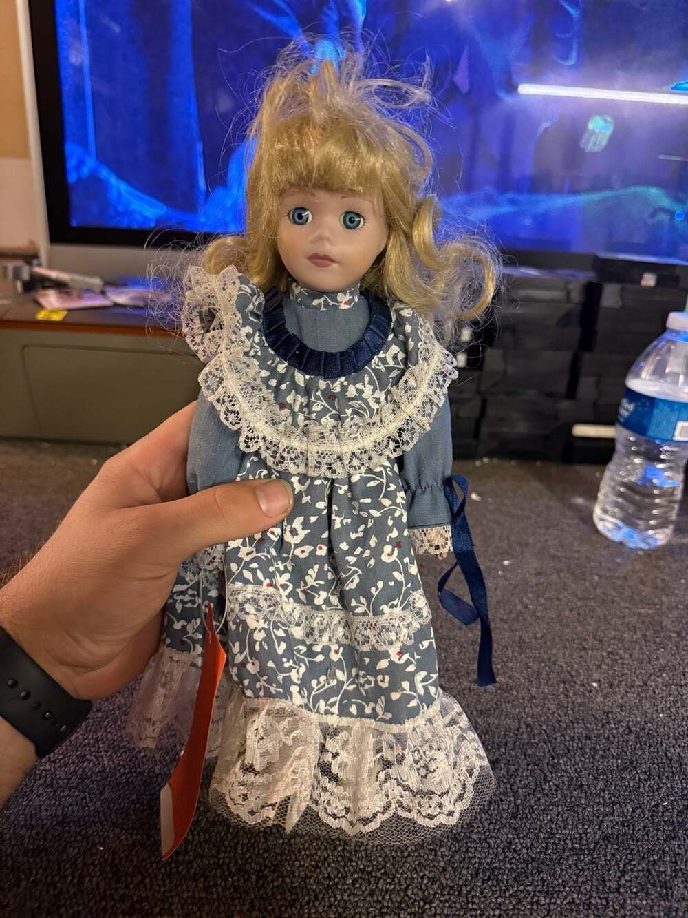 Vintage Collectible 16-inch Porcelain Doll with Blonde Curls and Blue Floral Dre